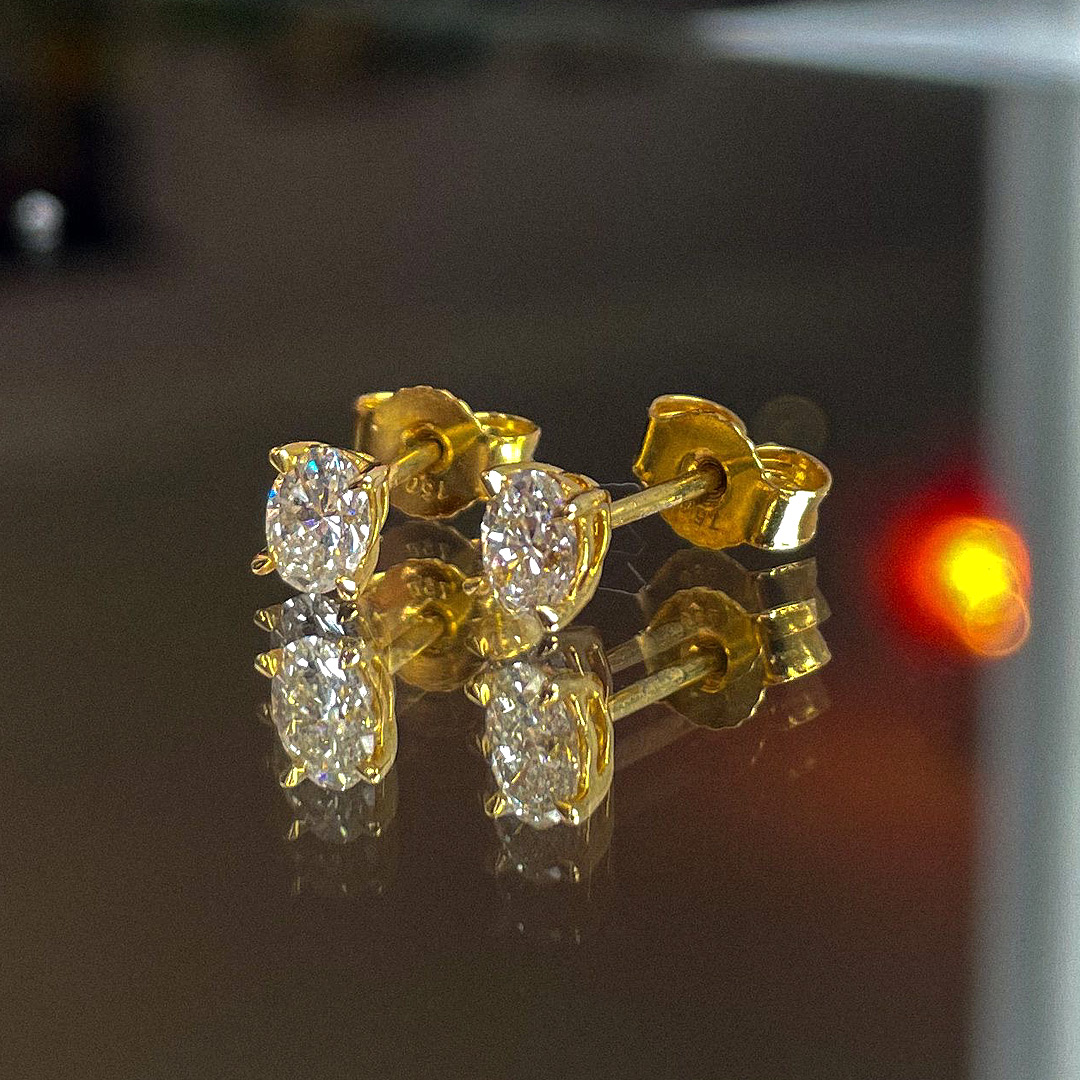 0.60ct Oval Diamond 18ct Yellow Gold Studs