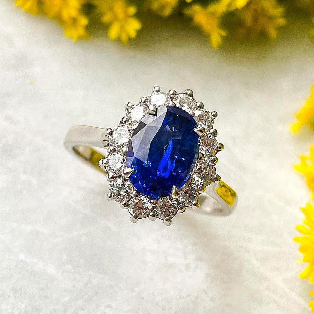 'Starburst' 2.00ct Oval Blue Sapphire 0.64ct Diamond Halo Platinum Ring